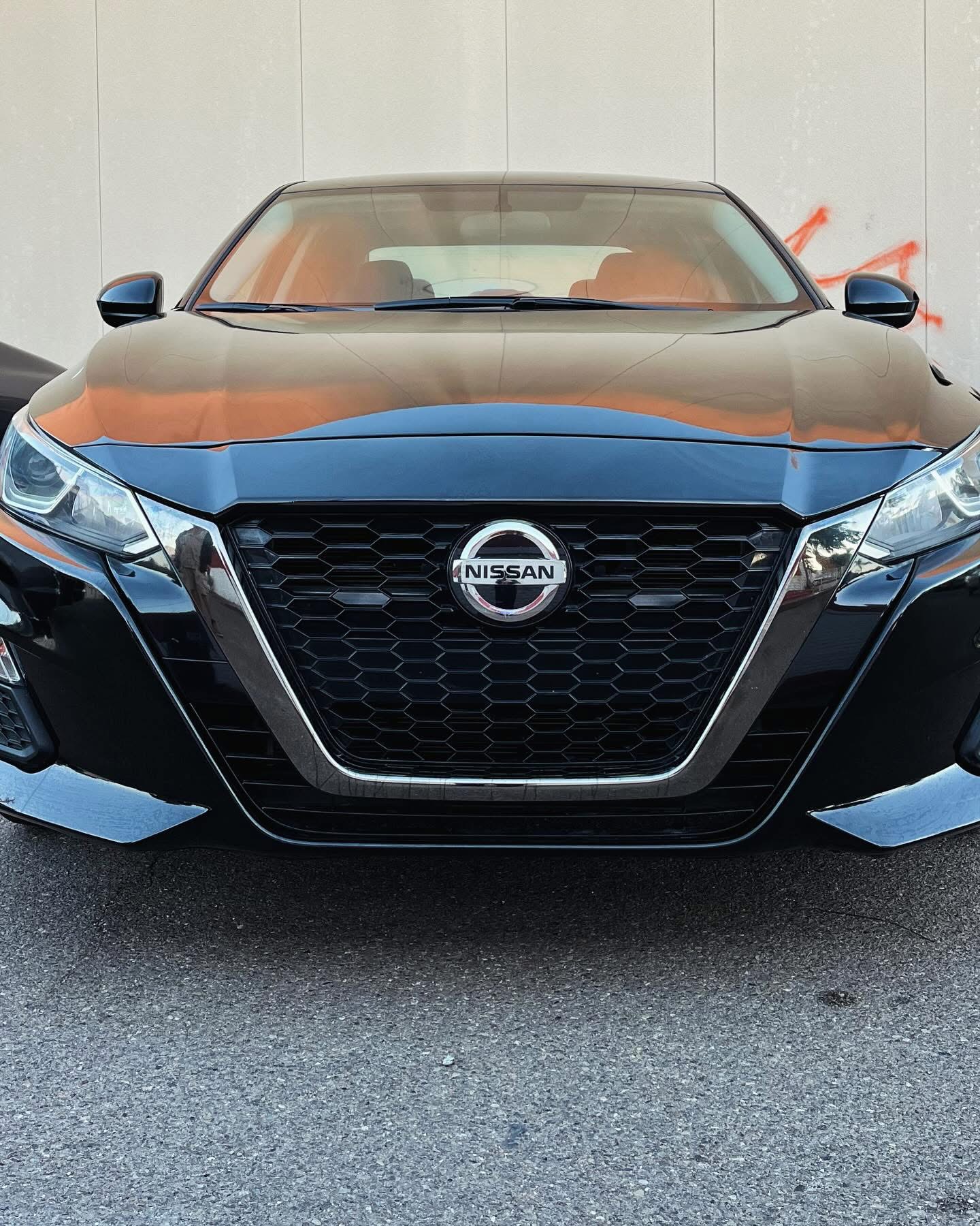 Black Nissan after exterior detailing